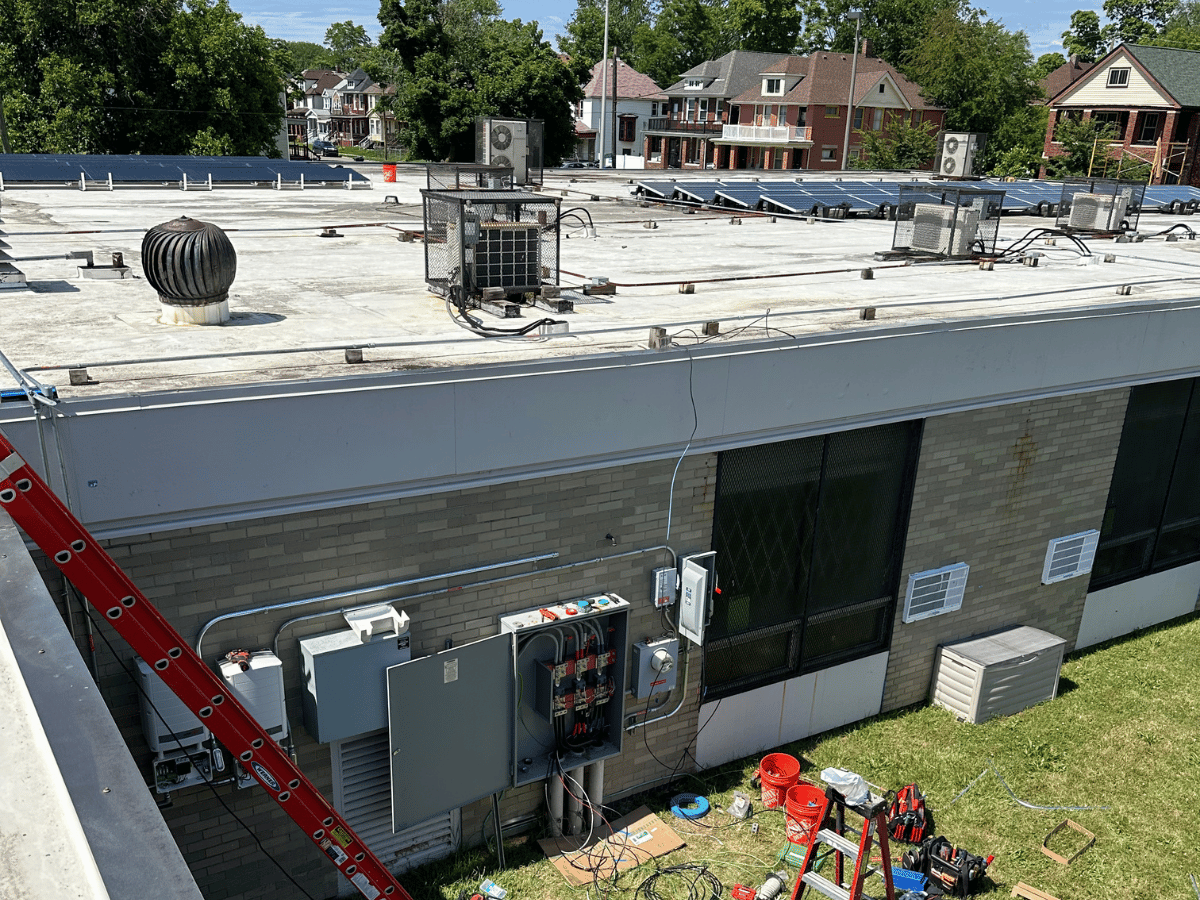 Boggs School side view showing building and completed rooftop solar arrays